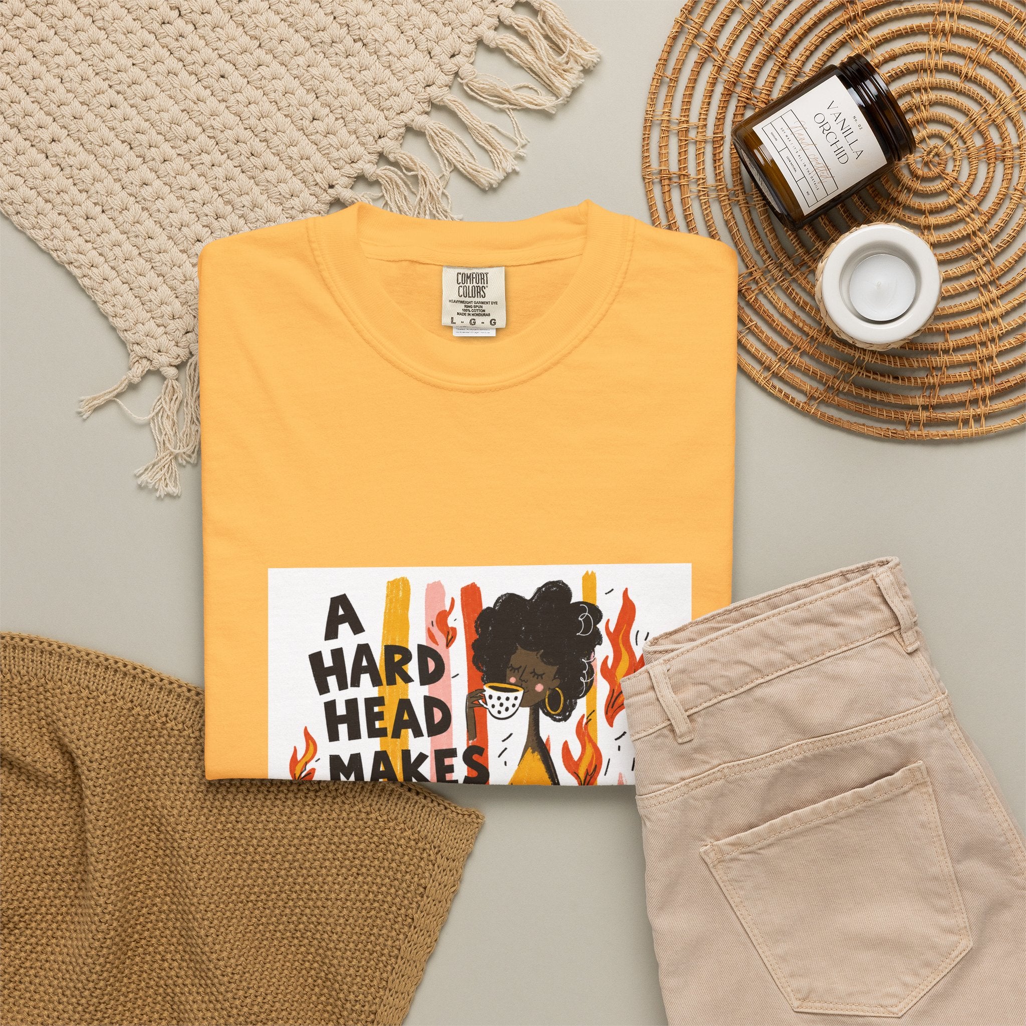 Graphic T-Shirt — "A Hard Head Makes a Soft Behind" Retro Afro Girl Design